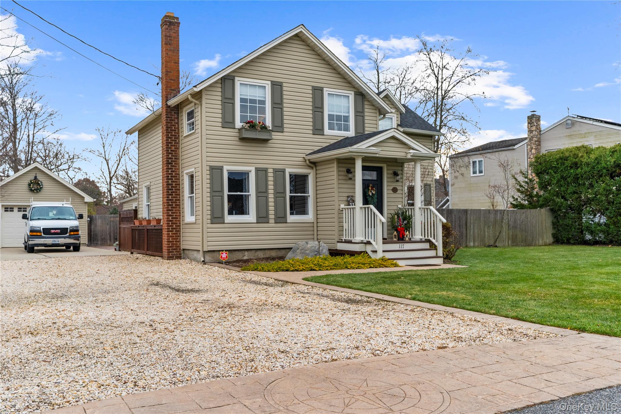 117 Union Avenue Islip, NY 11751 - Photo 33 of 33 a front view of a house with a yard