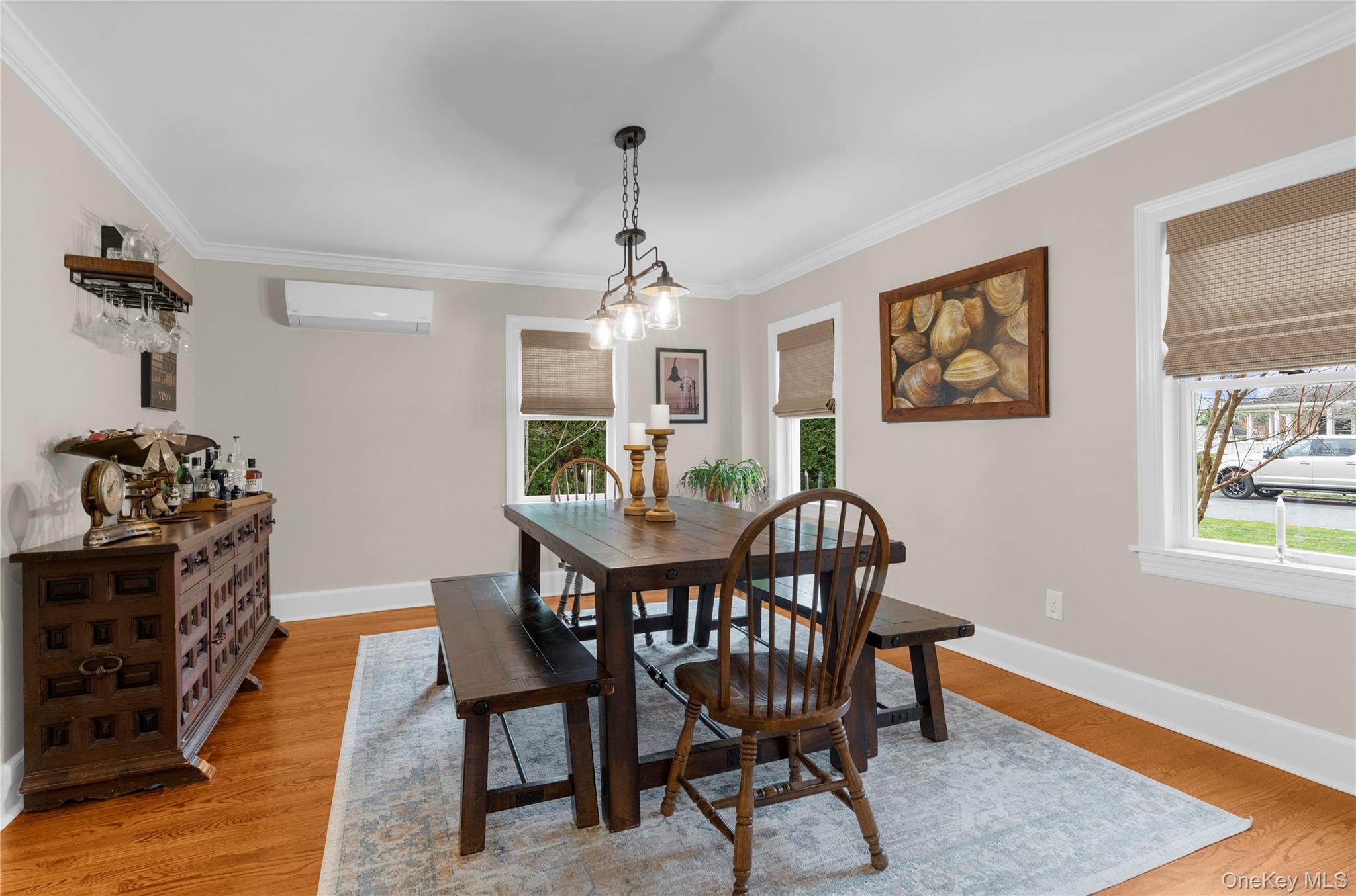 117 Union Avenue Islip, NY 11751 - Photo 7 of 33 a view of a dining room with furniture and wooden floor