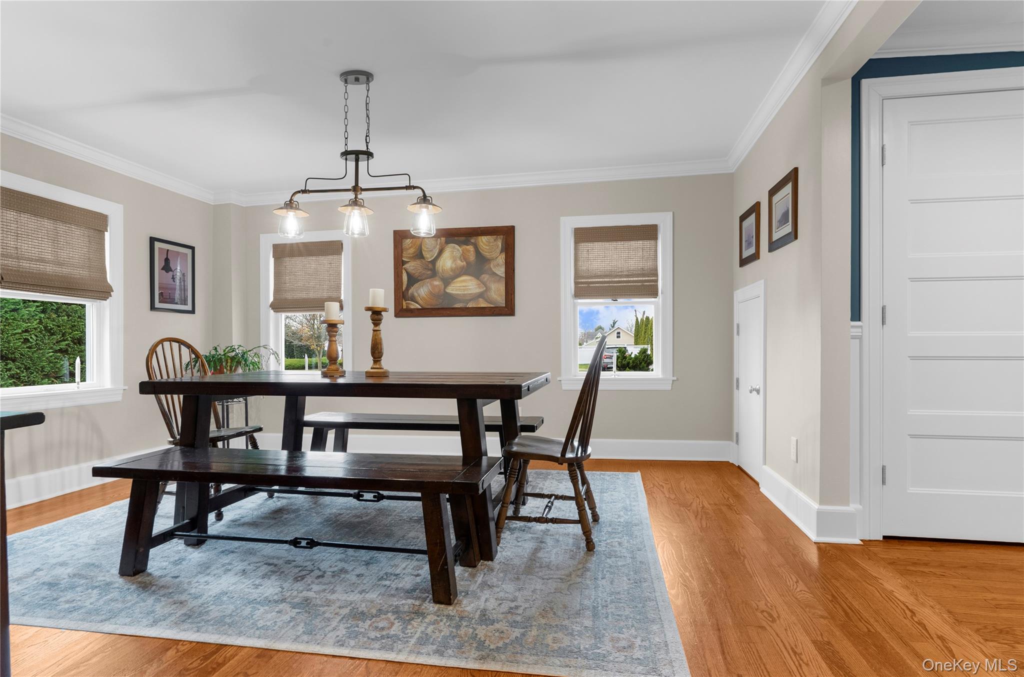 117 Union Avenue Islip, NY 11751 - Photo 8 of 33 a view of a dining room with furniture window and wooden floor