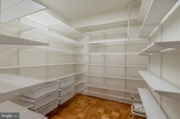 a kitchen with a sink stove and refrigerator