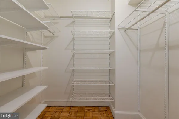 a bedroom with a bed and a cabinets