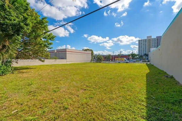 a view of a lake with a big yard