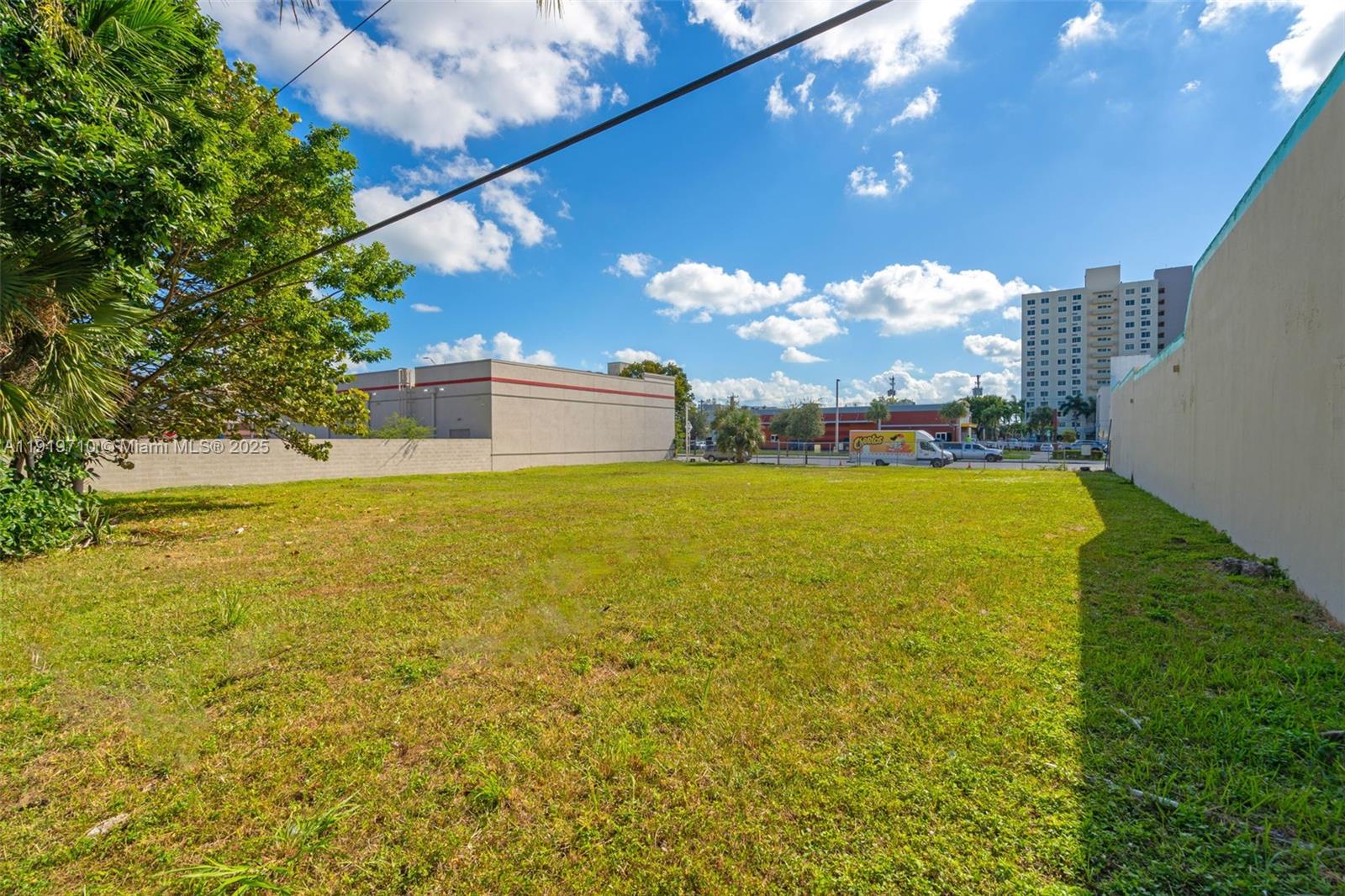 1025 West Flagler Street Miami, FL 33128 - Photo 16 of 21 a view of a lake with a big yard