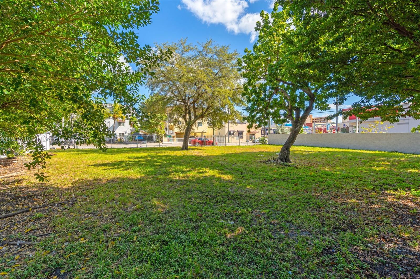 1025 West Flagler Street Miami, FL 33128 - Photo 20 of 21 a view of a trees in front of a house