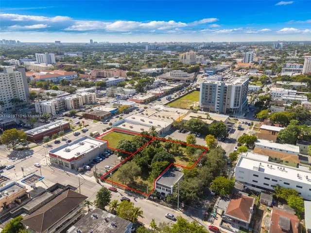 an aerial view of a city with lots of residential buildings