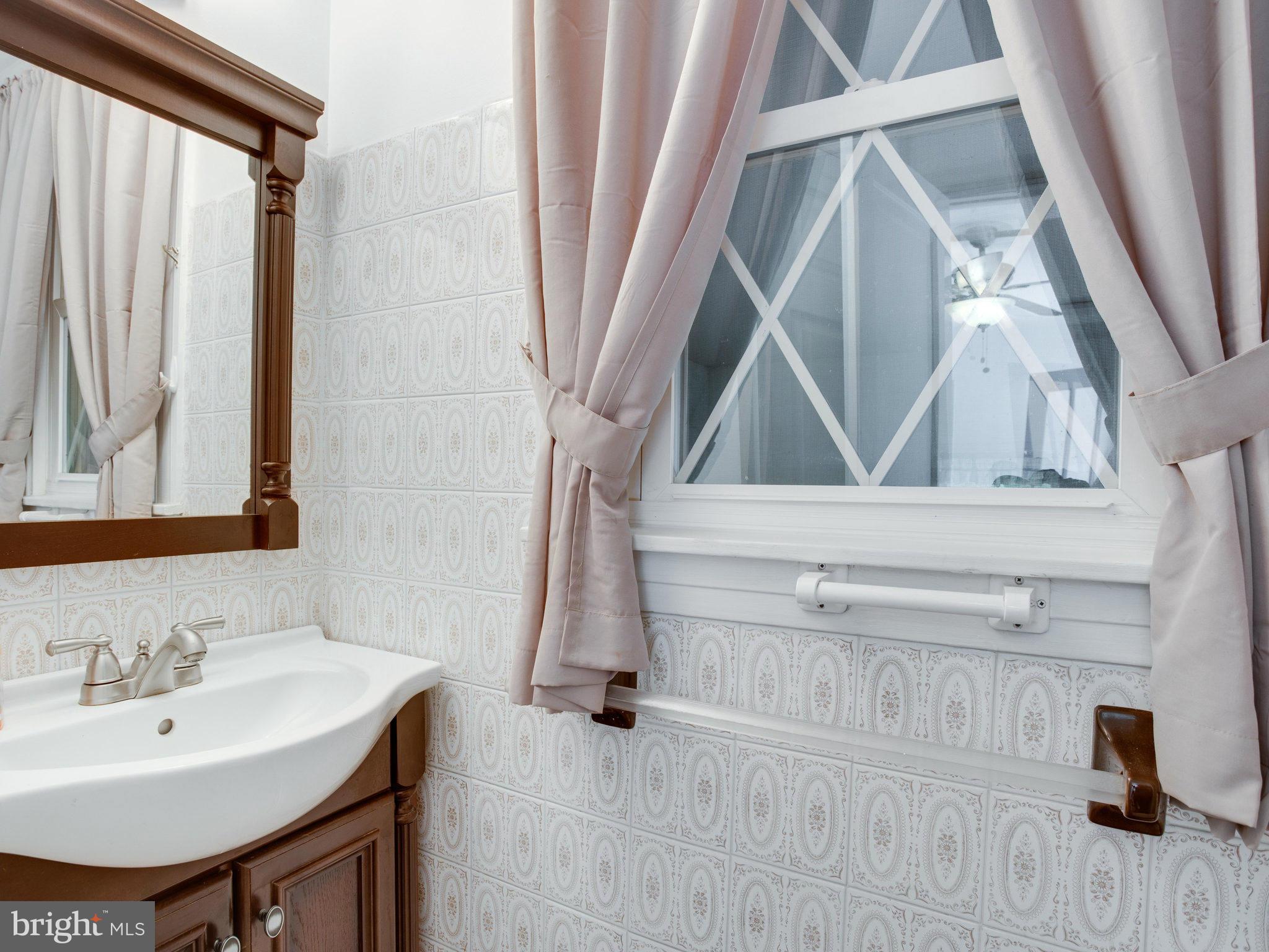 7155 Briscoe Turn Road Owings, MD 20736 - Photo 12 of 30 Powder Room on Main Level