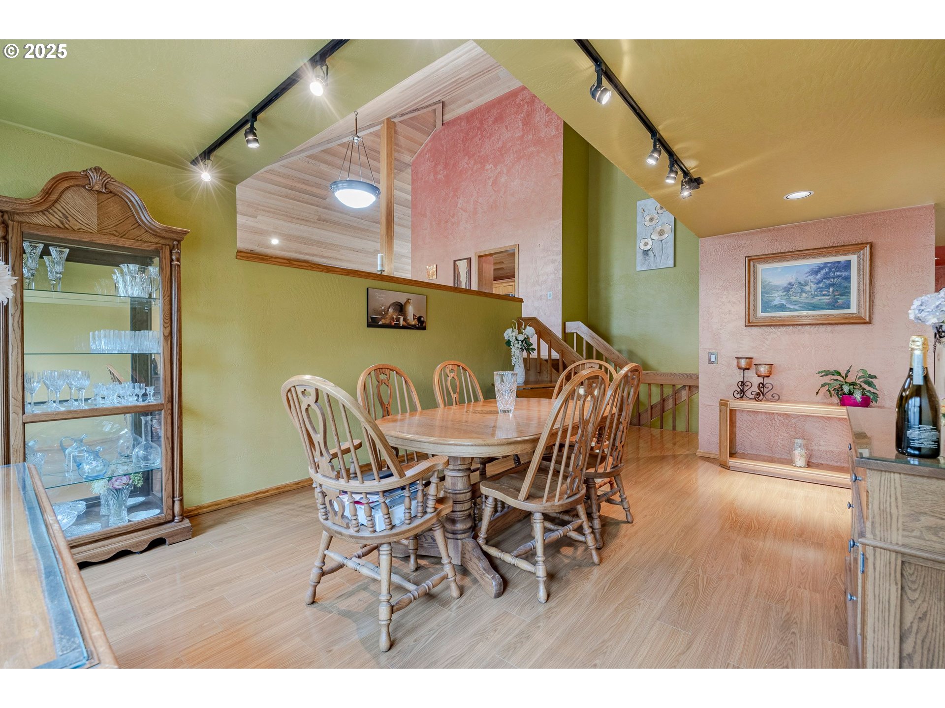 1710 White Oak Drive Eugene, OR 97405 - Photo 11 of 45 a view of a dining room with furniture and wooden floor