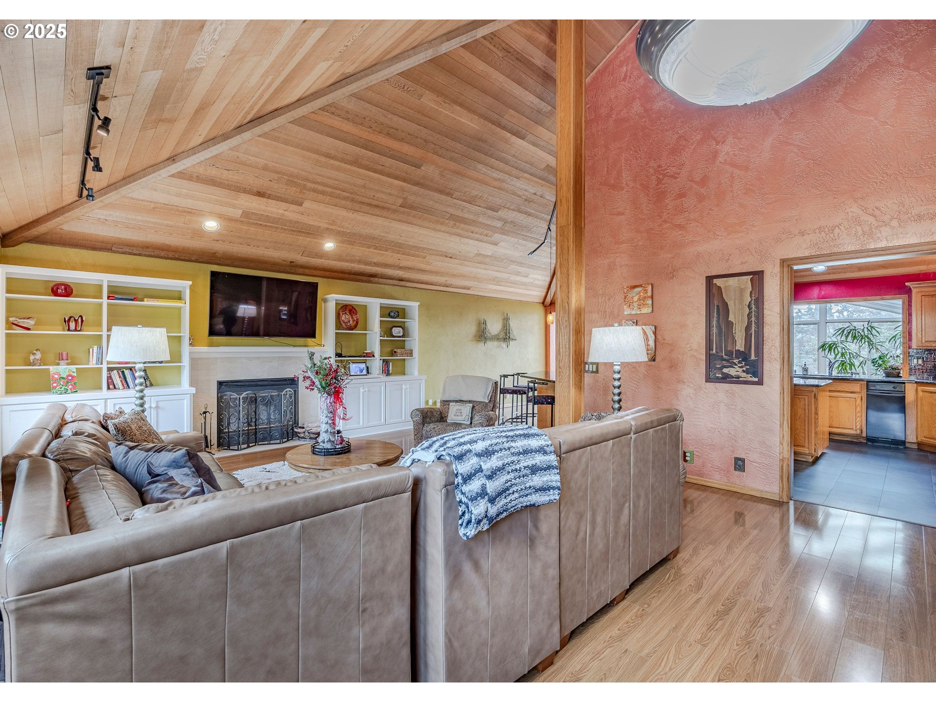 1710 White Oak Drive Eugene, OR 97405 - Photo 13 of 45 a living room with furniture and a fireplace