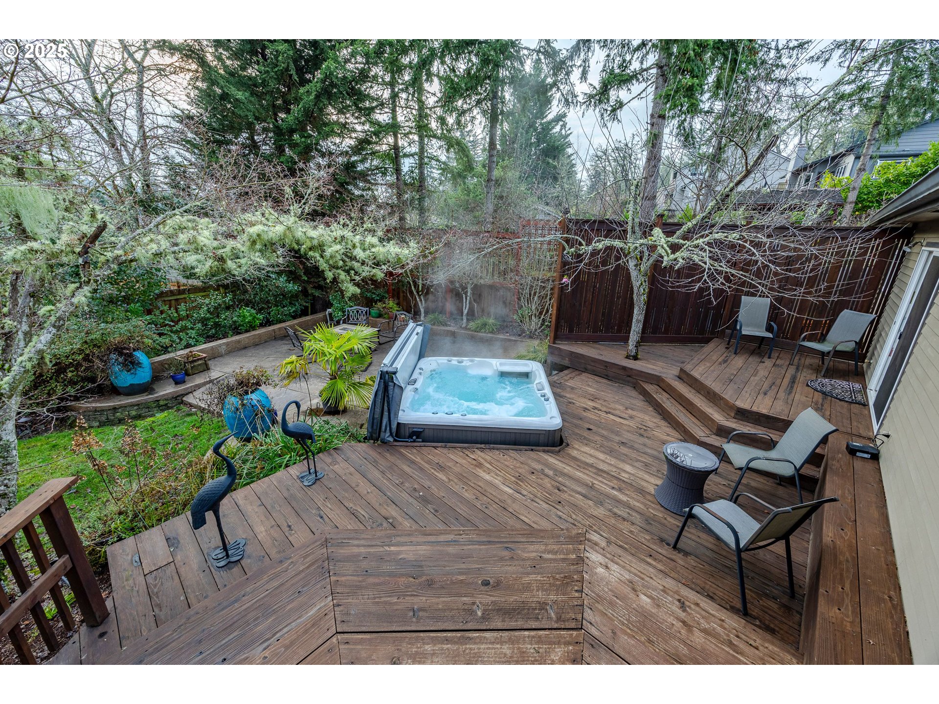 1710 White Oak Drive Eugene, OR 97405 - Photo 21 of 45 a view of a chairs and bench in the garden