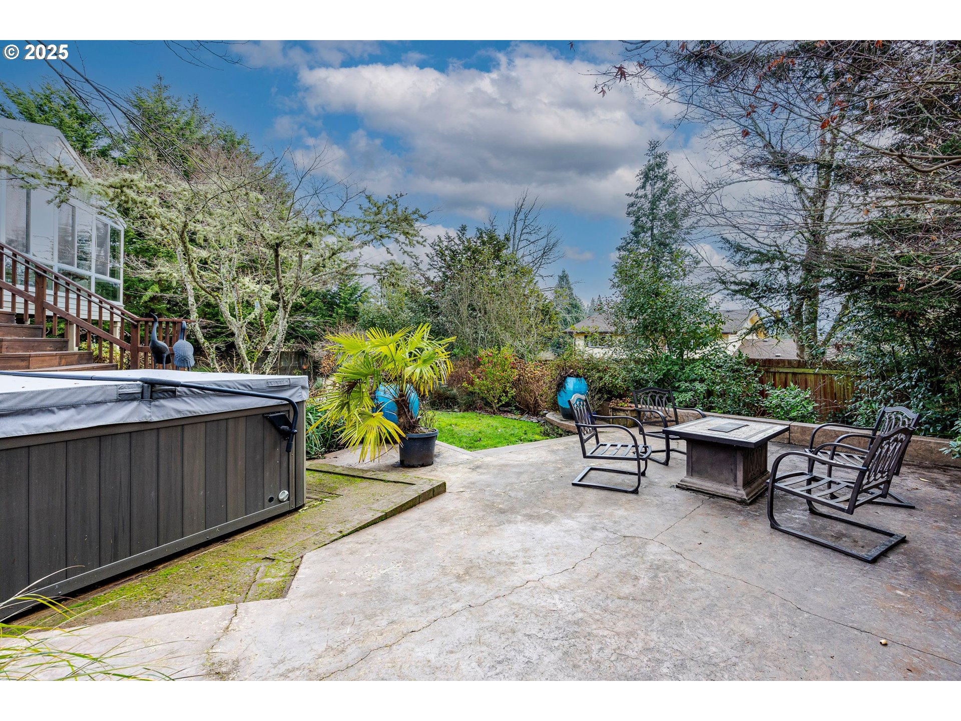 1710 White Oak Drive Eugene, OR 97405 - Photo 24 of 45 a view of a patio with a table and chairs