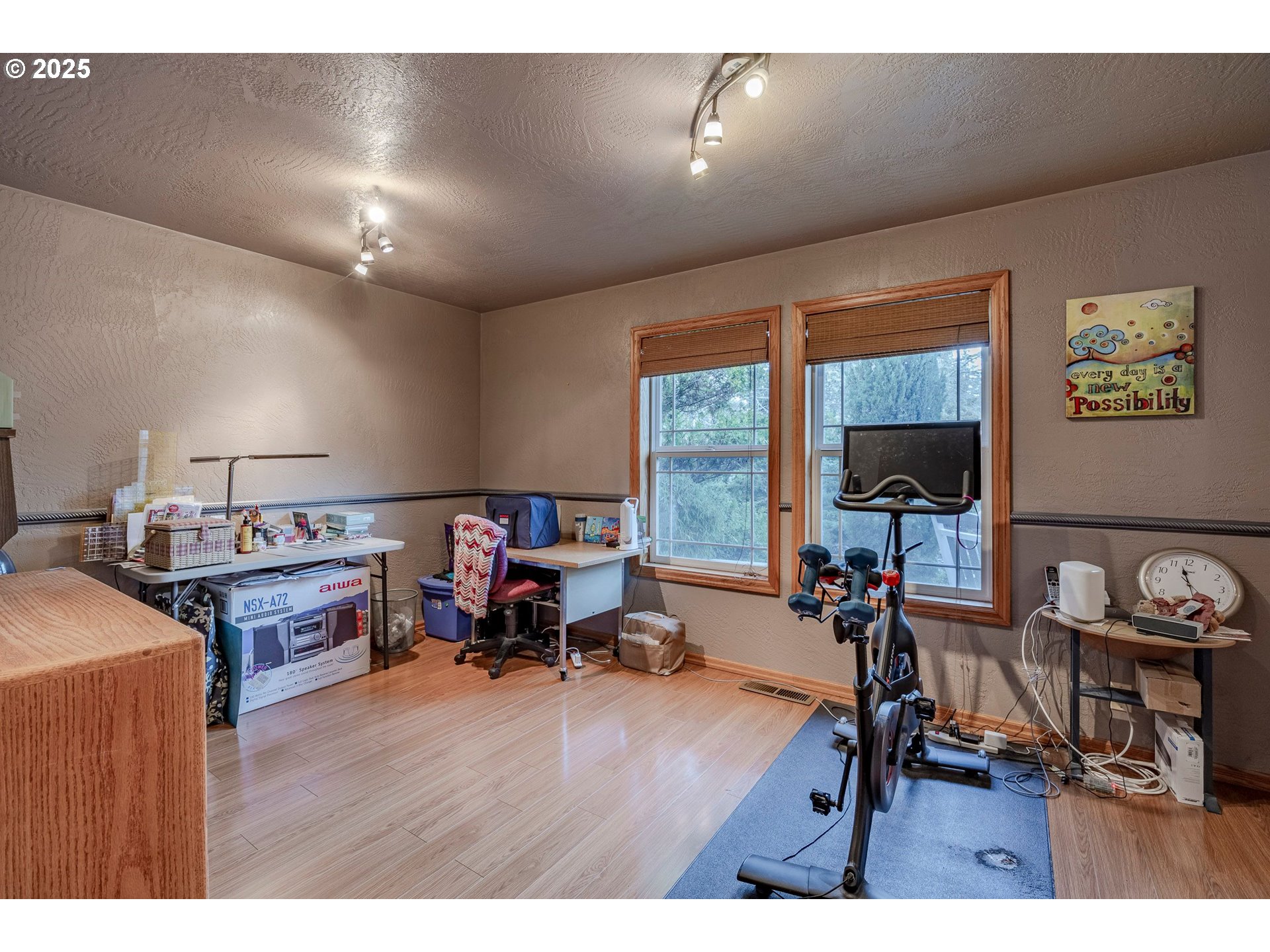 1710 White Oak Drive Eugene, OR 97405 - Photo 36 of 45 a living room with furniture and a flat screen tv