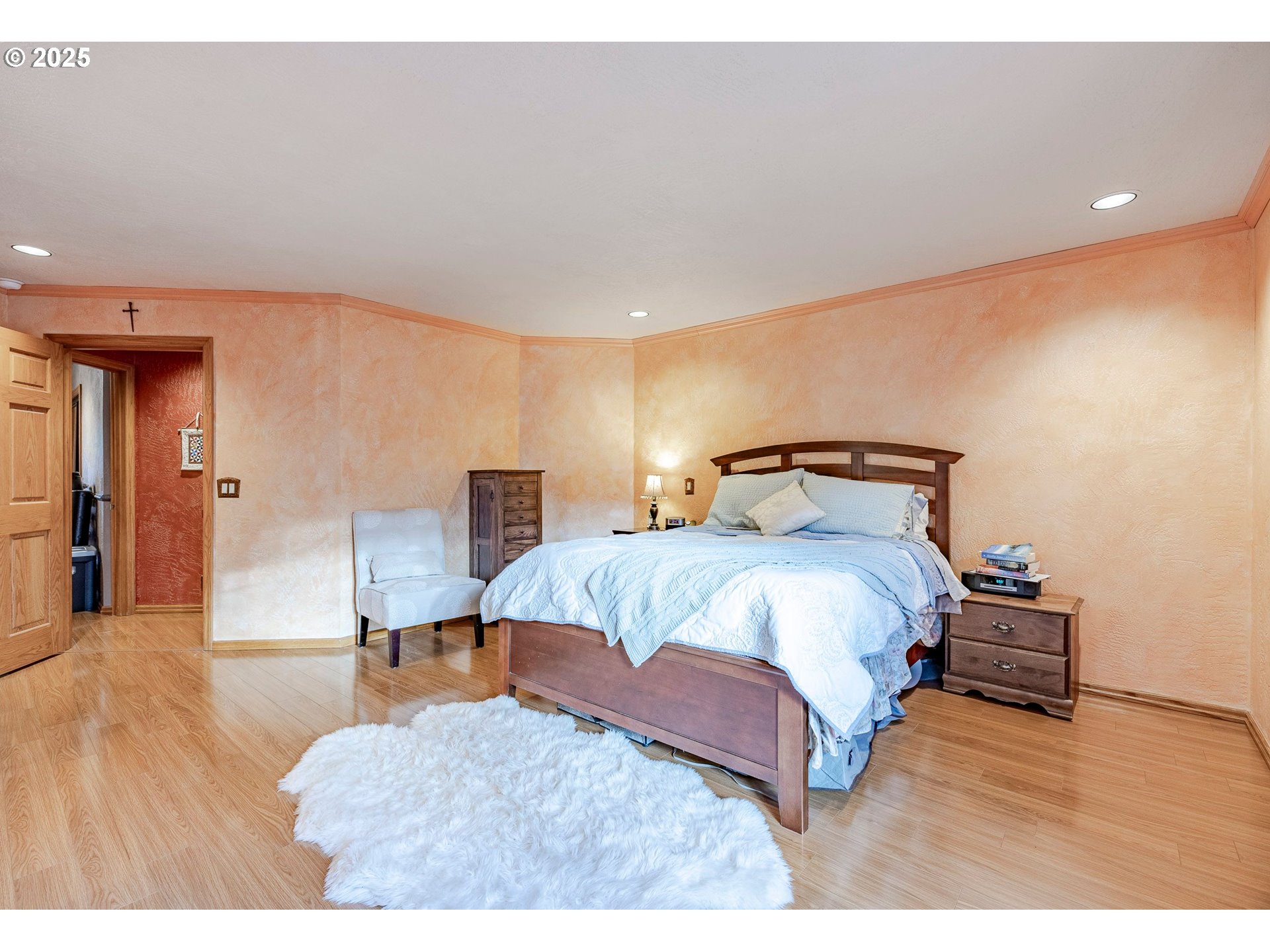 1710 White Oak Drive Eugene, OR 97405 - Photo 39 of 45 a bedroom with a bed and wooden floor