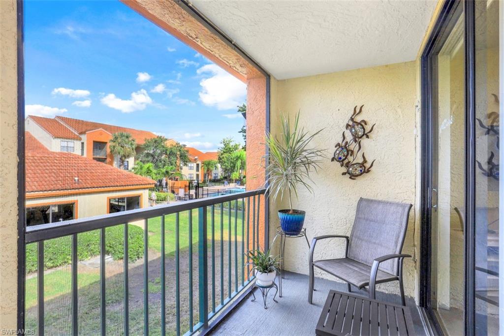13621 Eagle Ridge Drive, Unit 1522 Fort Myers, FL 33912 - Photo 17 of 22 a view of a balcony with furniture