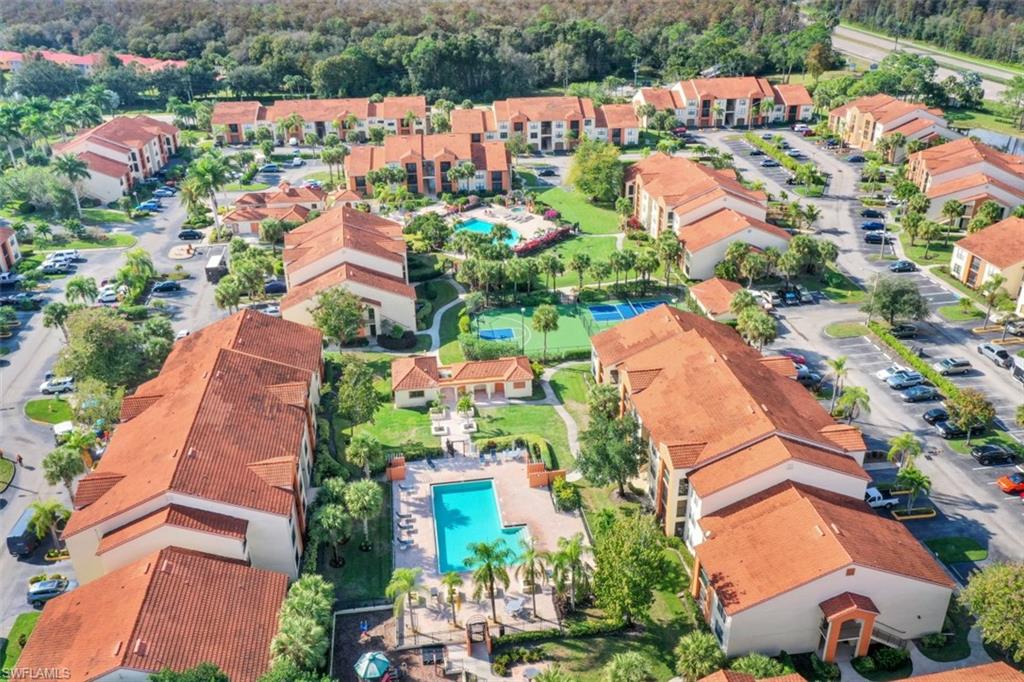 13621 Eagle Ridge Drive, Unit 1522 Fort Myers, FL 33912 - Photo 22 of 22 an aerial view of residential houses with outdoor space