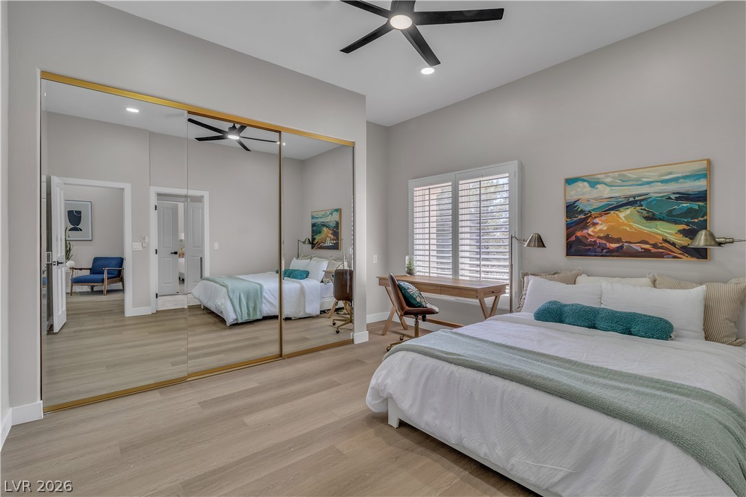 8848 Rainbow Ridge Drive Las Vegas, NV 89117 - Photo 21 of 43 Hardwood floors and generous mirrored closet doors complete this restful sleeping area.
