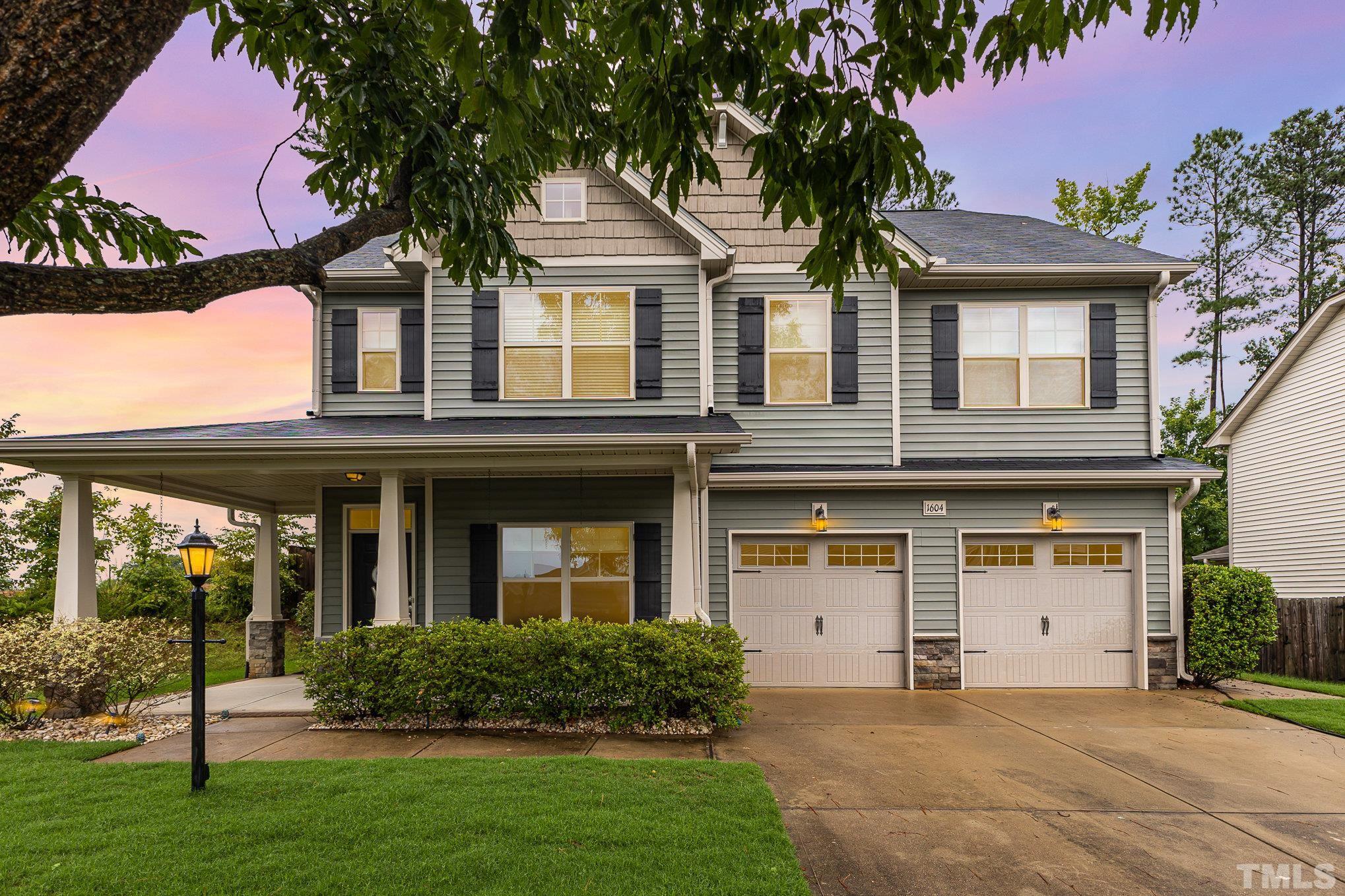 1604 Hauser Lake Road Knightdale, NC 27545 - Photo 1 of 32 front view of a house with a yard