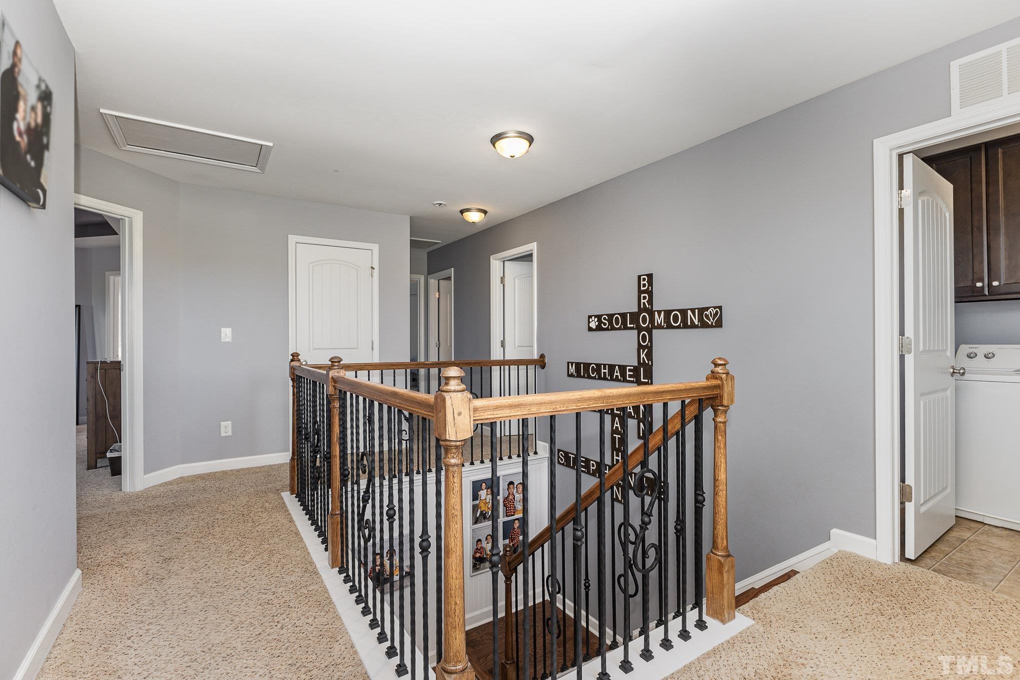 1604 Hauser Lake Road Knightdale, NC 27545 - Photo 17 of 32 a view of entryway with wooden floor