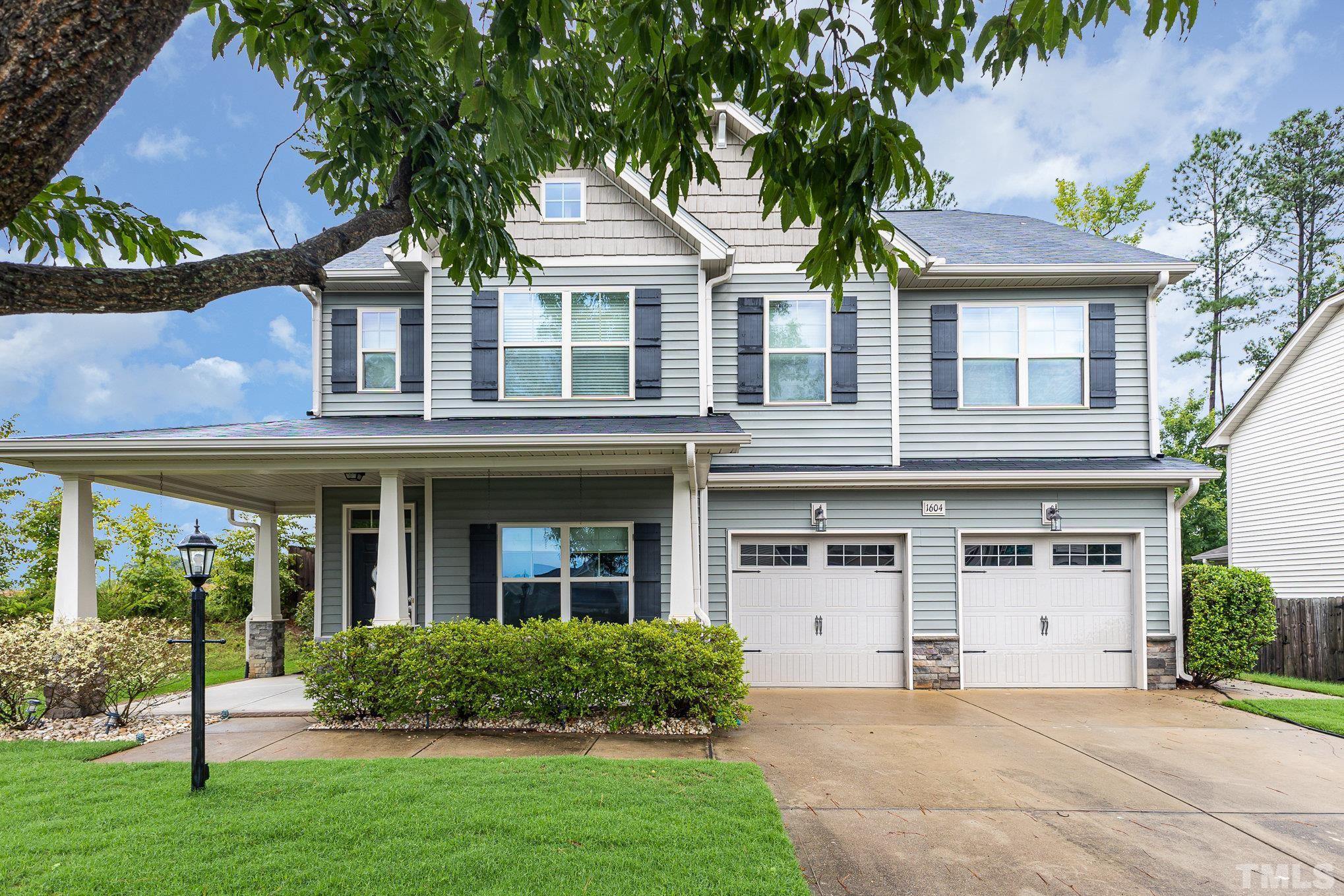 1604 Hauser Lake Road Knightdale, NC 27545 - Photo 3 of 32 front view of a house with a yard