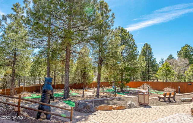 a view of a swimming pool with an ocean view