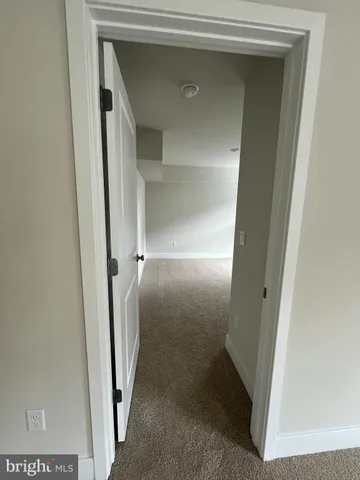 a view of a room with an empty space