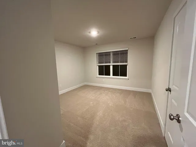 a view of empty room with window