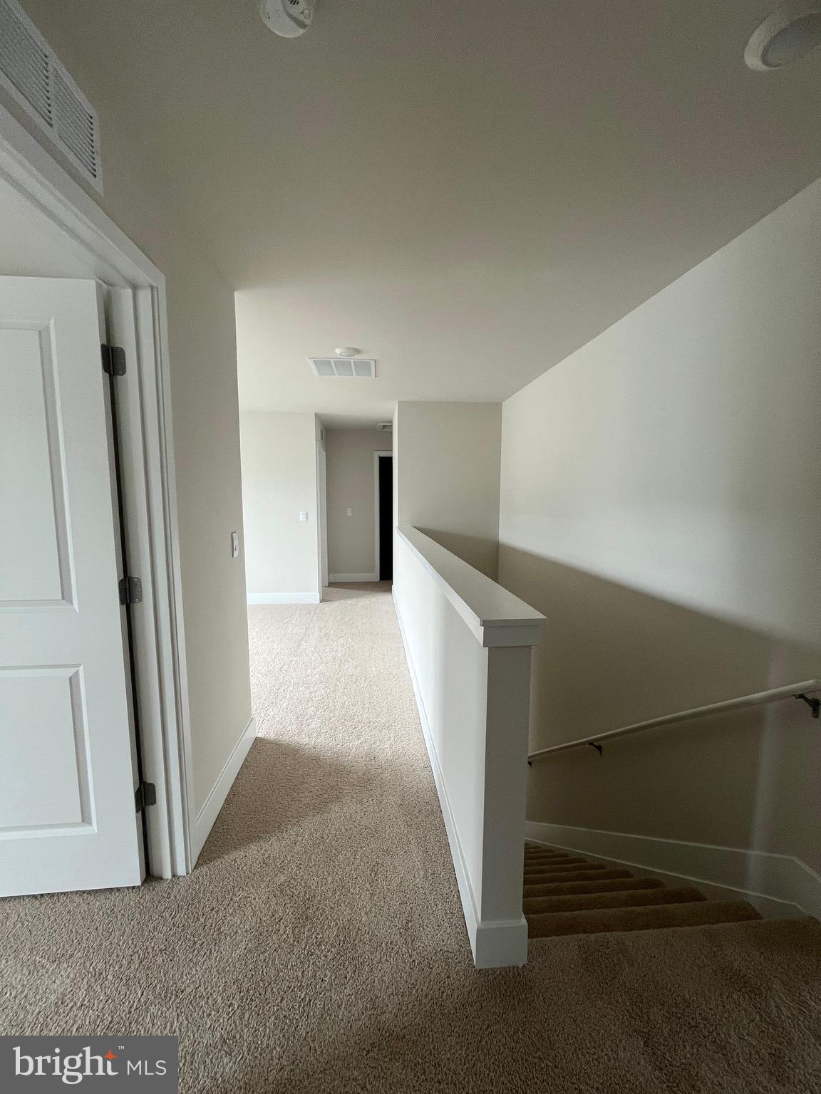 117 Manasquan Way Winchester, VA 22602 - Photo 20 of 34 a view of entryway with stairs and wooden floor