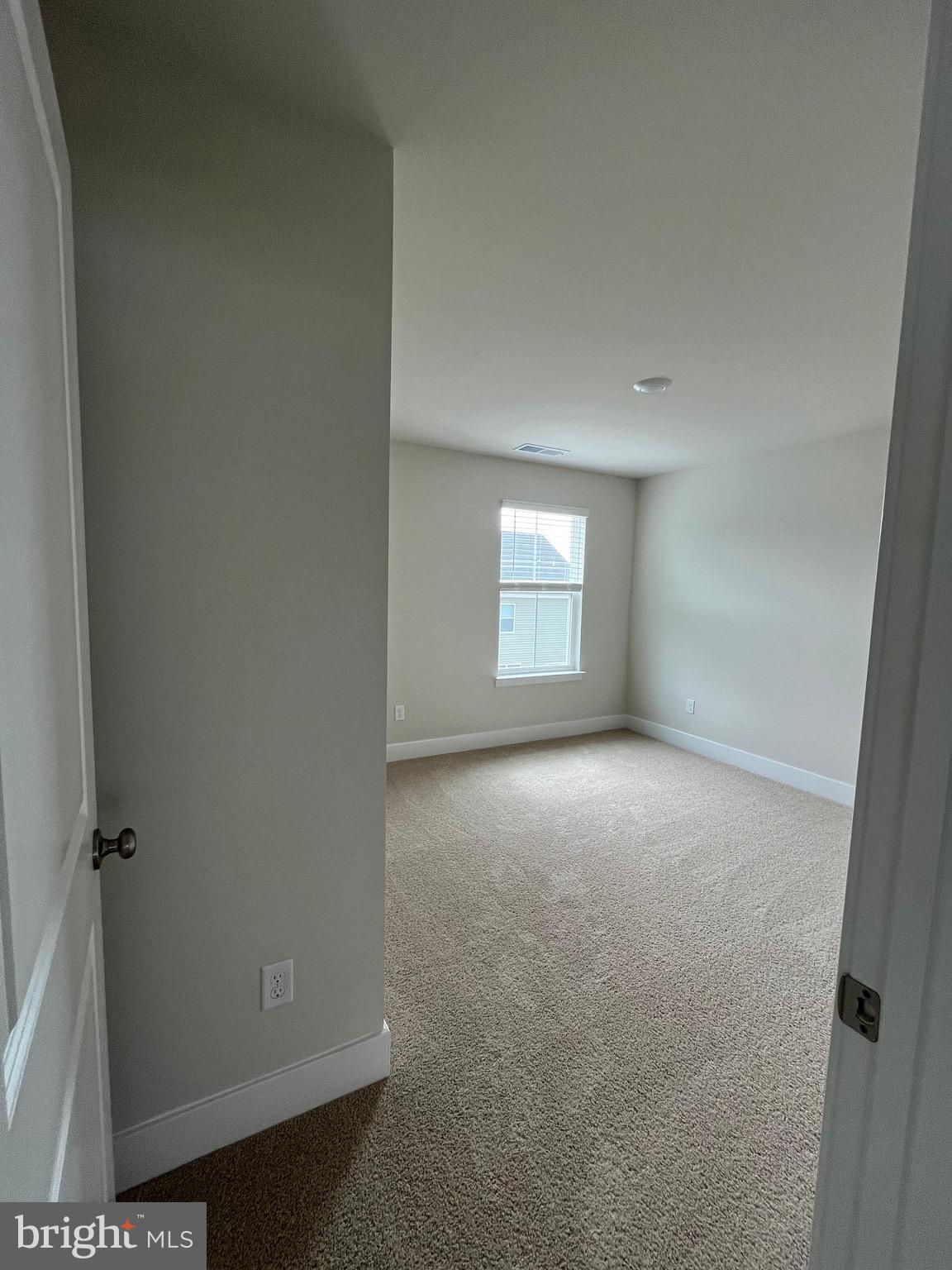 117 Manasquan Way Winchester, VA 22602 - Photo 21 of 34 an empty room with windows
