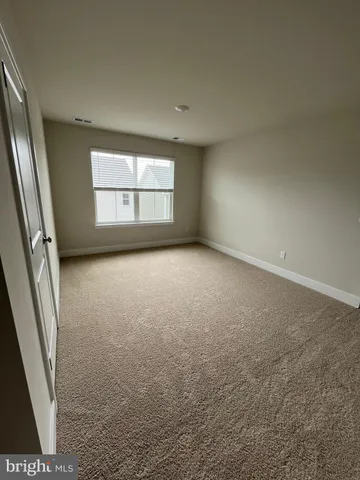 an empty room with an entryway
