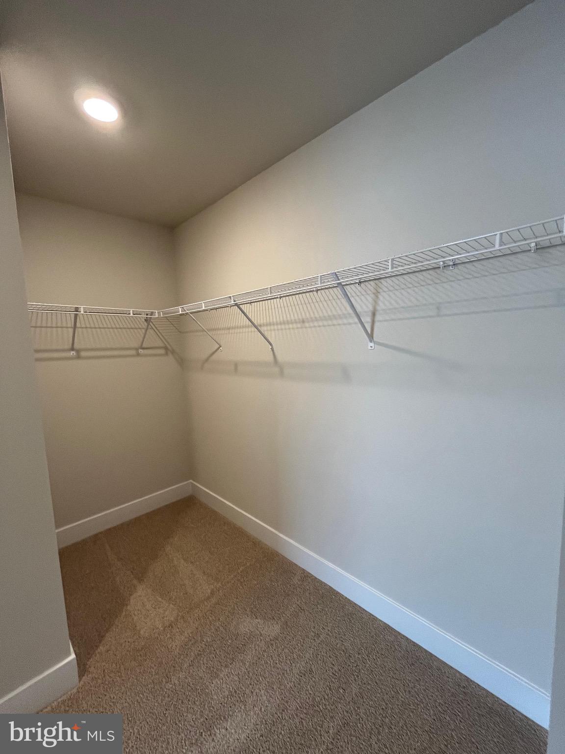 117 Manasquan Way Winchester, VA 22602 - Photo 33 of 34 a view of a room with racks on the wall