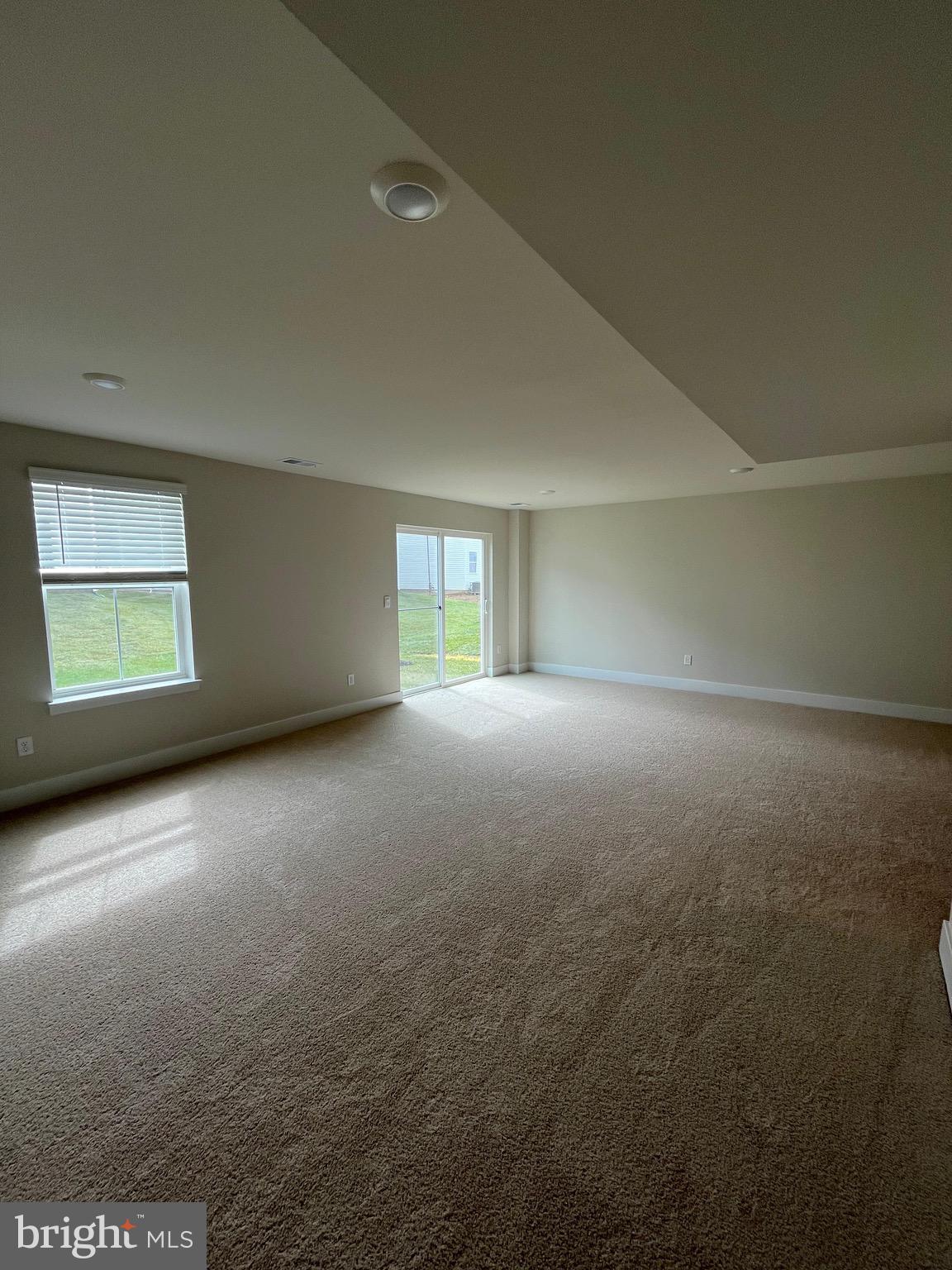 117 Manasquan Way Winchester, VA 22602 - Photo 4 of 34 a view of an empty room with a window