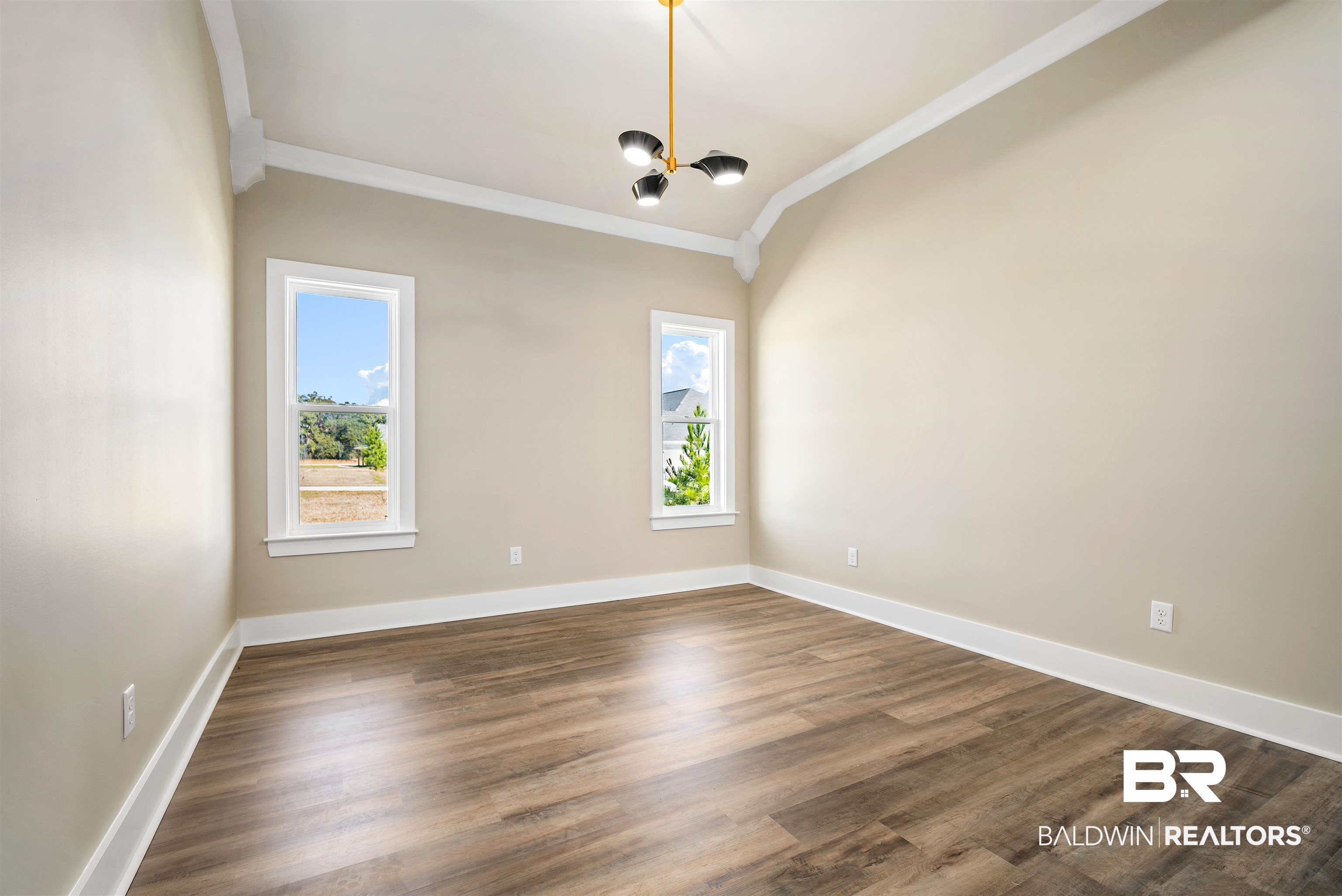 188 Hampton Ridge Mobile, AL 36608 - Photo 15 of 37 Flex room with a notable chandelier, plenty of natural light, and crown molding. Can be used as second office, schoolroom, or living room.