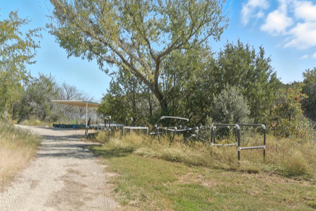 4636 Halsell Ranch Road Jacksboro, TX 76458 - Photo 29 of 40 a view of a lake with houses