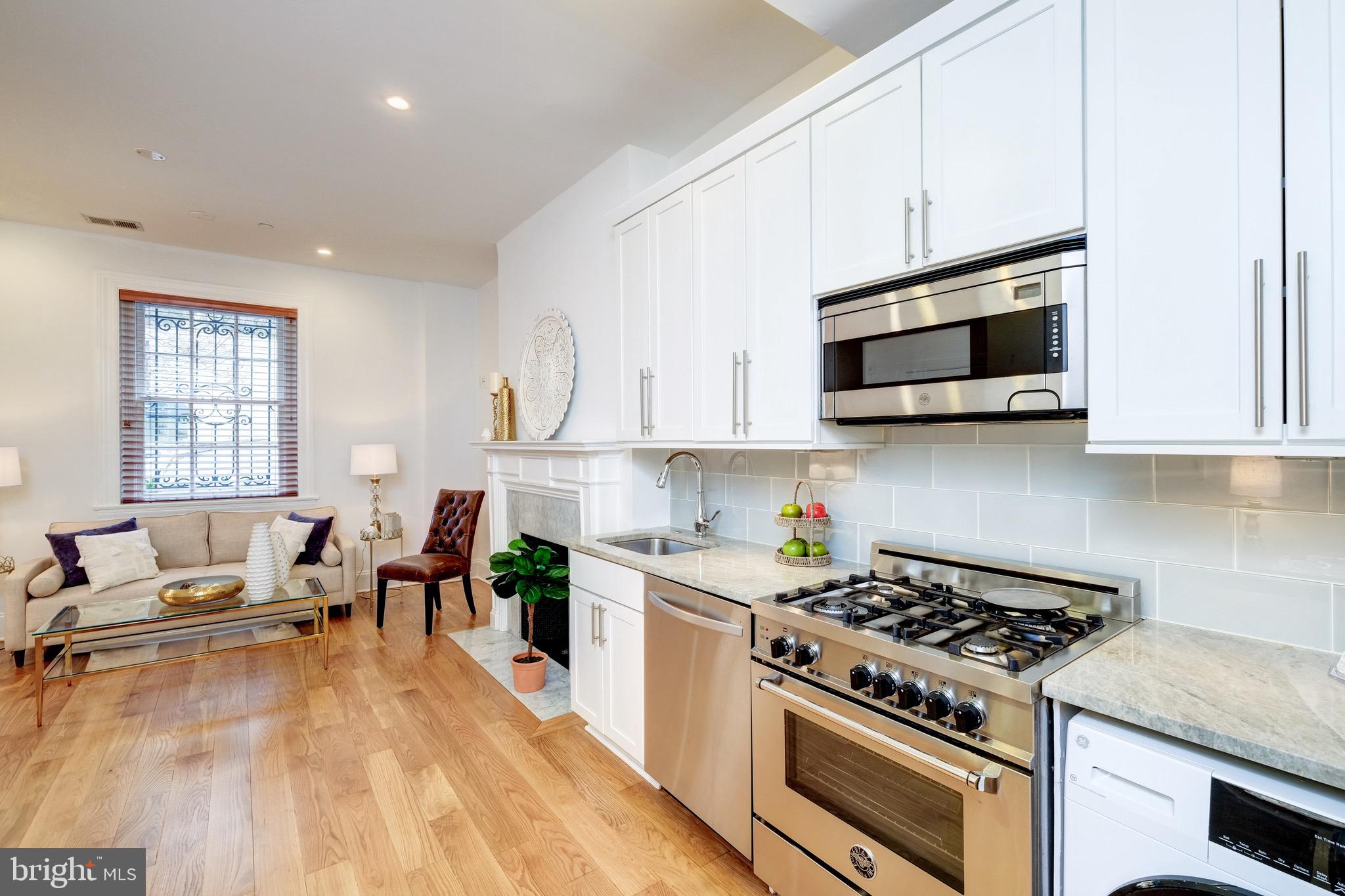 1929 19th Street Northwest, Unit 1 Washington, DC 20009 - Photo 13 of 21 GE Profile refrigerator & high-efficiency wash/dry