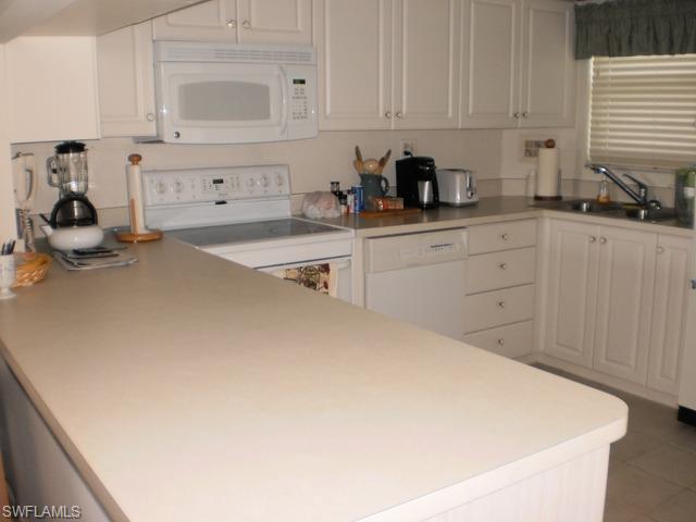 9 High Point Circle North, Unit 302 Naples, FL 34103 - Photo 3 of 8 Gallery Image 3