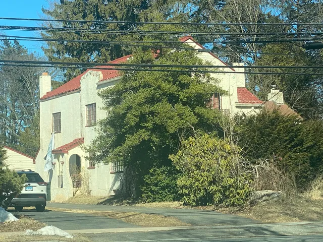 a view of a lake with a building in the background