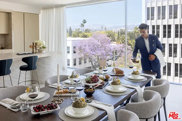 a view of a building with potted plants