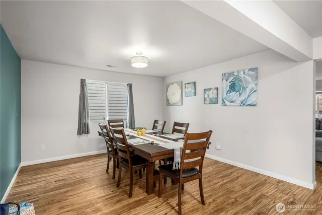a view of a dining room with furniture