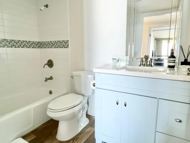 a balcony with wooden floor