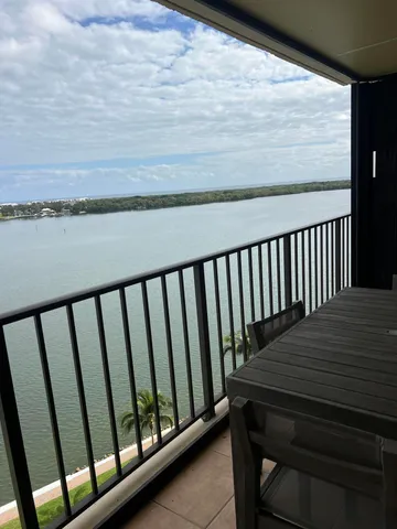 a close up of a wall with paintings on the wall