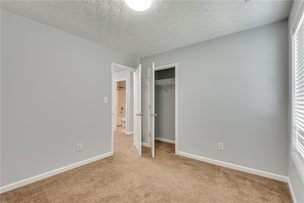 3337 Baymount Way Lawrenceville, GA 30043 - Photo 35 of 47 an empty room with closet