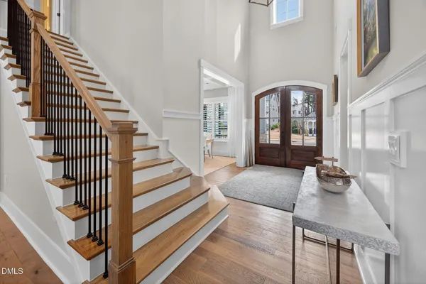 a kitchen with stainless steel appliances a stove a sink and cabinets