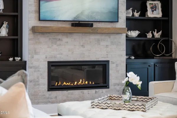 a white stove top oven sitting inside of a kitchen
