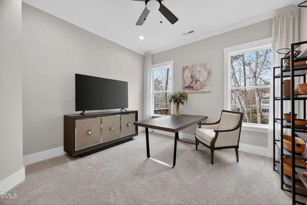 a bathroom with a granite countertop sink a toilet and a bathtub