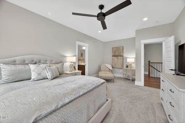 a kitchen with stainless steel appliances granite countertop a sink a stove and cabinets