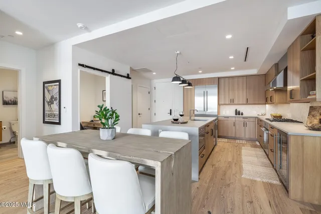 a view of a workspace with furniture