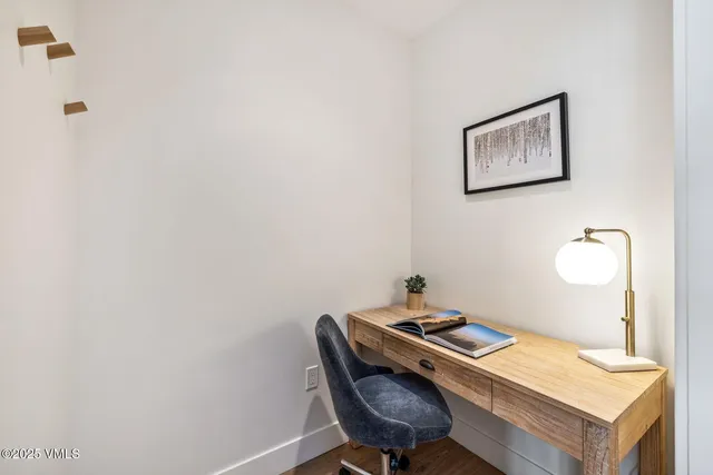 a bathroom with a tub and shower