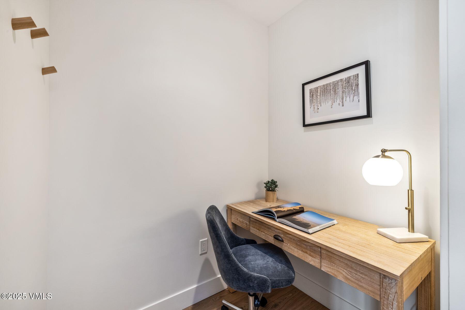 38460 Highway 6, Unit 310 Avon, CO 81620 - Photo 7 of 32 a view of a workspace with furniture