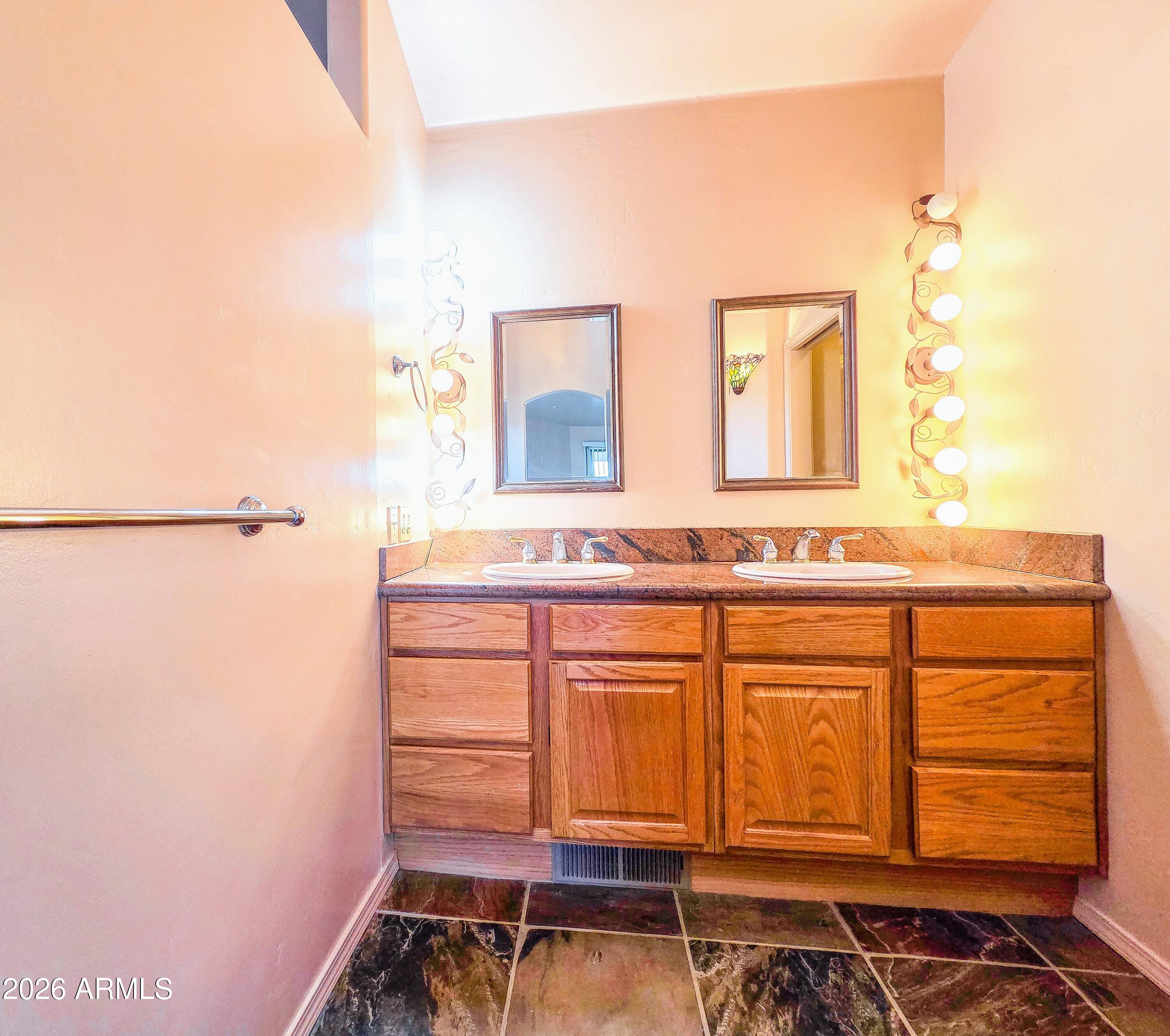 14350 East Meadow Ranch Place Dewey, AZ 86327 - Photo 23 of 54 a bathroom with a sink and a mirror