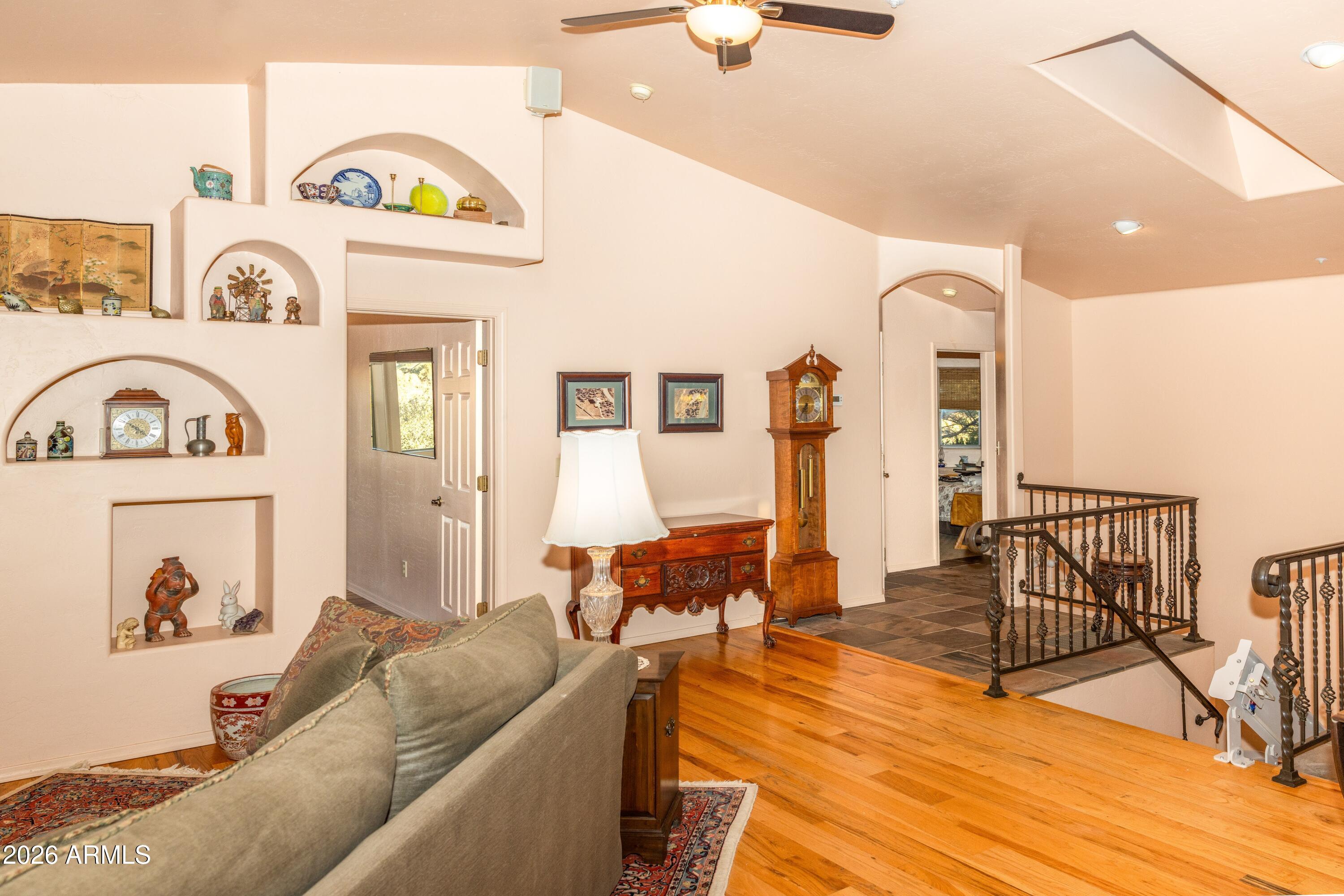 14350 East Meadow Ranch Place Dewey, AZ 86327 - Photo 26 of 54 a living room with furniture and a clock