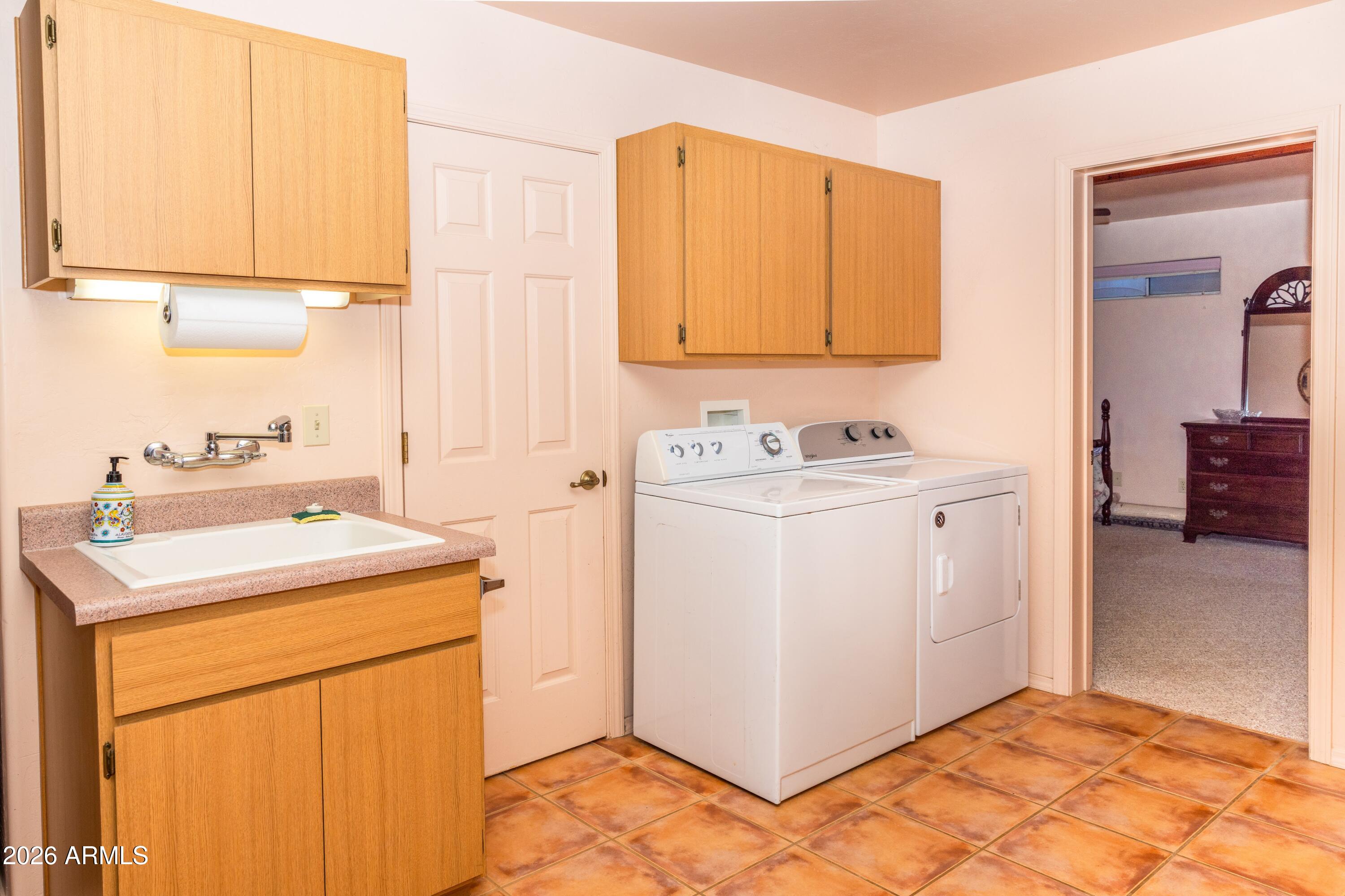 14350 East Meadow Ranch Place Dewey, AZ 86327 - Photo 34 of 54 a utility room with dryer and washer